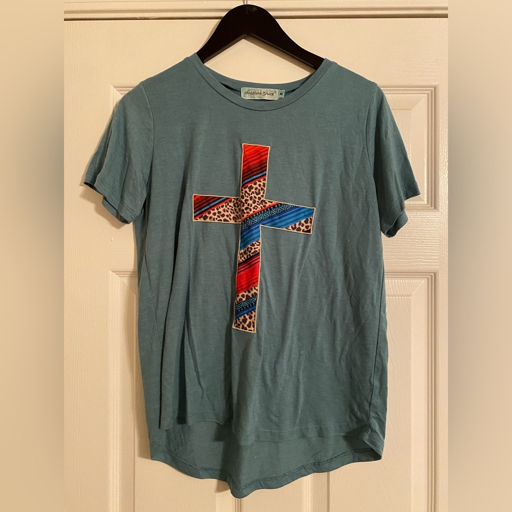 🐠Southern Grace Women’s Short Sleeve High/Low Teal T-Shirt with Cross Design